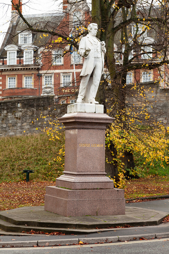 leeman-statue-autumn 
 George Leeman statue standing at junction in York - Station Avenue / A1036 / Station Road / Station Rise.
Photo date: October 2020. Image ref: 5D2_29724. 
 Keywords: George Leeman statue, Station Avenue, York, City of York, North Yorkshire, England, autumn,